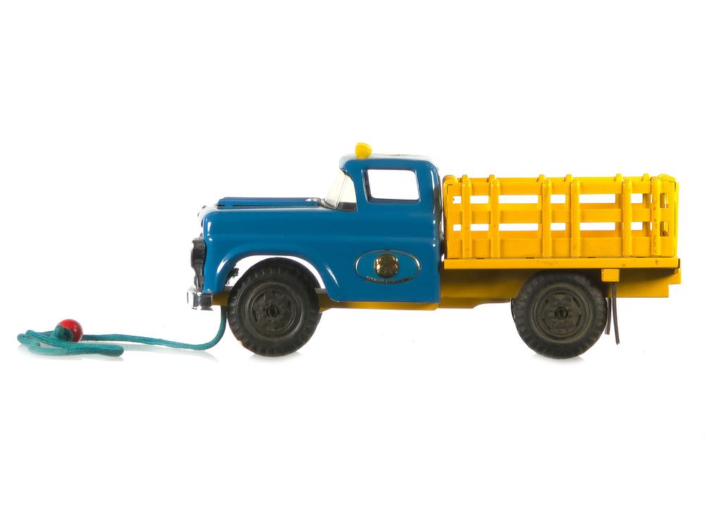 Lot 289: Marusan Pressed Steel Stake Truck Pull Toy Japan