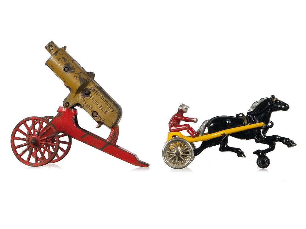 Lot 295: (2) Grey Iron Machine Gun and Kenton Sulky