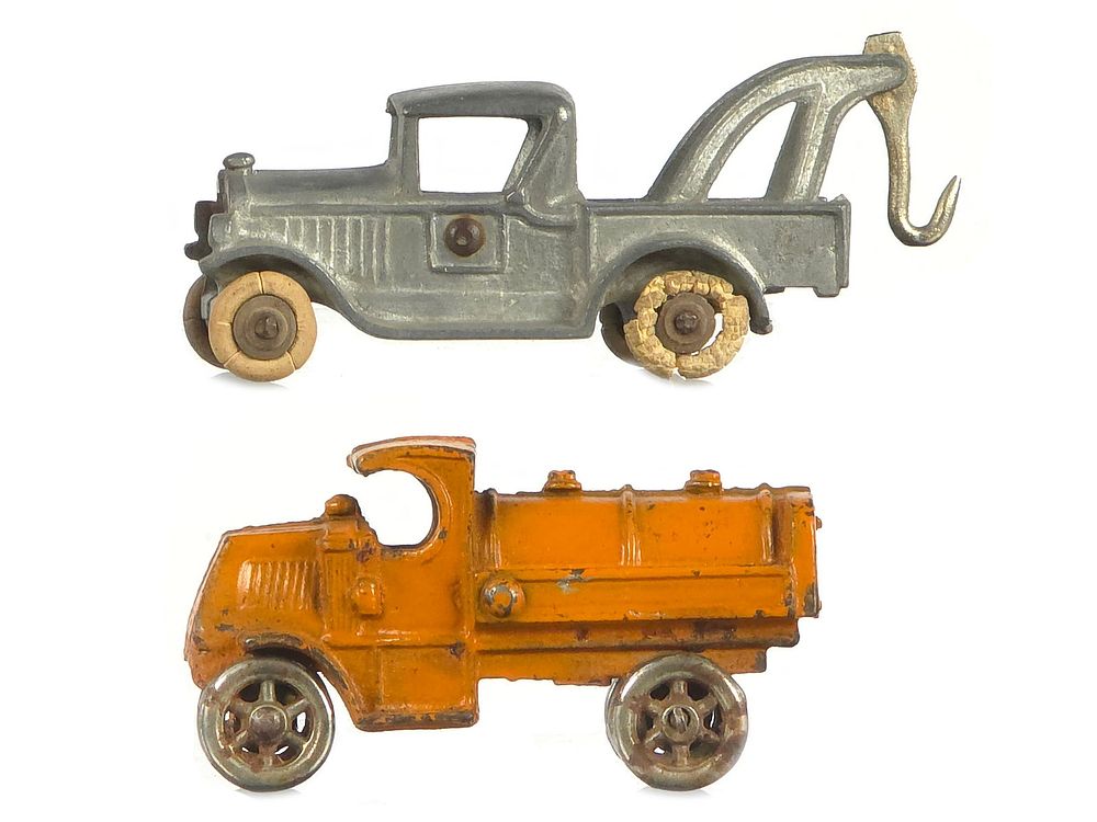 Lot 298: Dent Toys Aluminum Tow Truck and Hubley Cast Iron Gas Truck