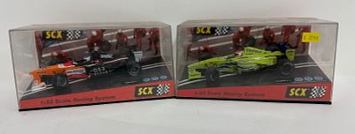 (2) SCX 1/32 Scale Minardi F-1/Arrows F-1. Minardi F-1/Arrows F-1, MIB and unused. Condition: GOOD