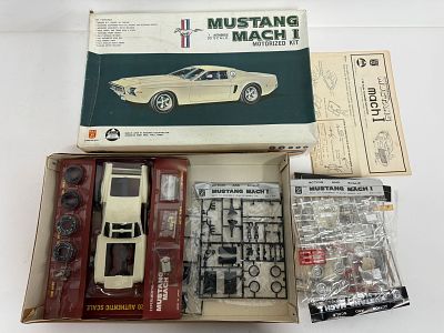 (2) Lotus and Mustang Model Kit Cars. Tamiya Lotus 49B Ford F-1 1/12/Nakamura Mustang Mach I 
