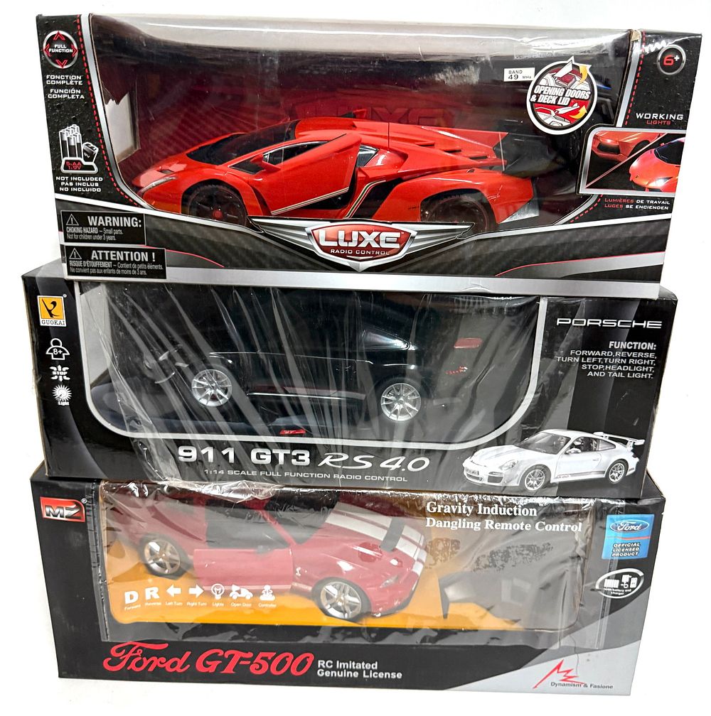 Lot 194: (3) R/C Race Cars Ford GT-500/Porsche 911 GT3/Bugatti