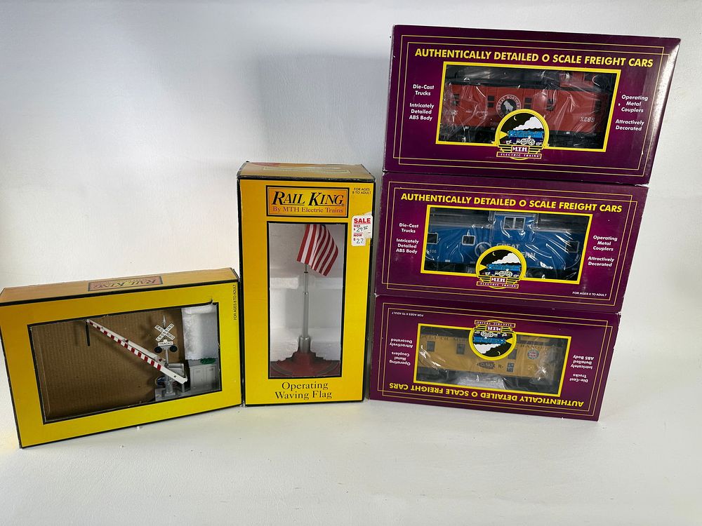 Lot 550: Lot of 5 Freight Cars and Crossing and Flag.