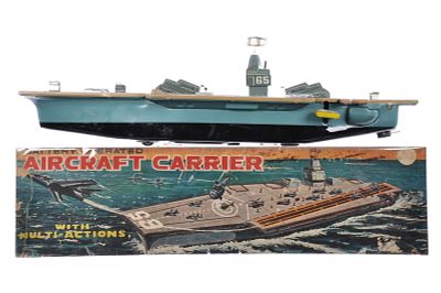 Large Marx Battery Operated Aircraft Carrier Boxed. A massive tin lithographed, battery-operated 