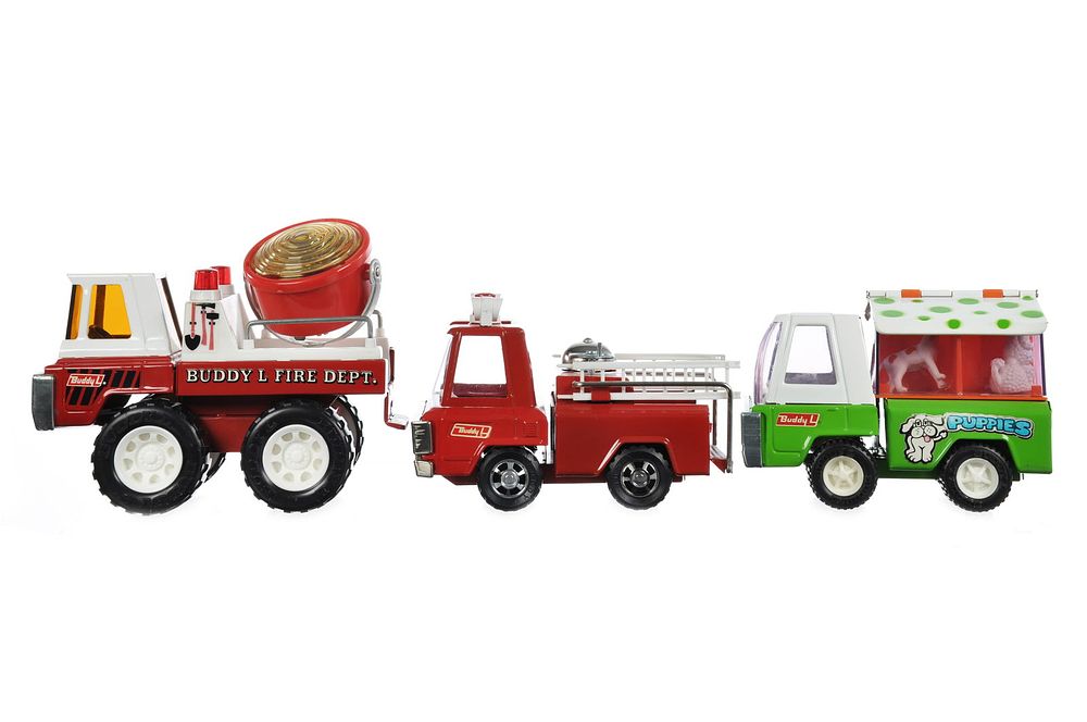 Lot 199: Buddy L Puppies & Fire Ladder & Fire Searchlight Trucks