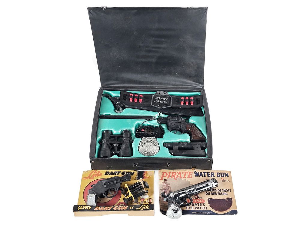 Lot 256: (3) Toy Guns Lido Dart Gun, Crime-Buster Briefcase, Pirate Gun