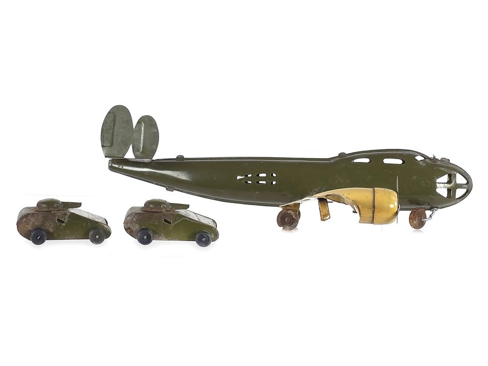 Lot 259: Buddy L Pressed Steel Army Airplane w/Tanks