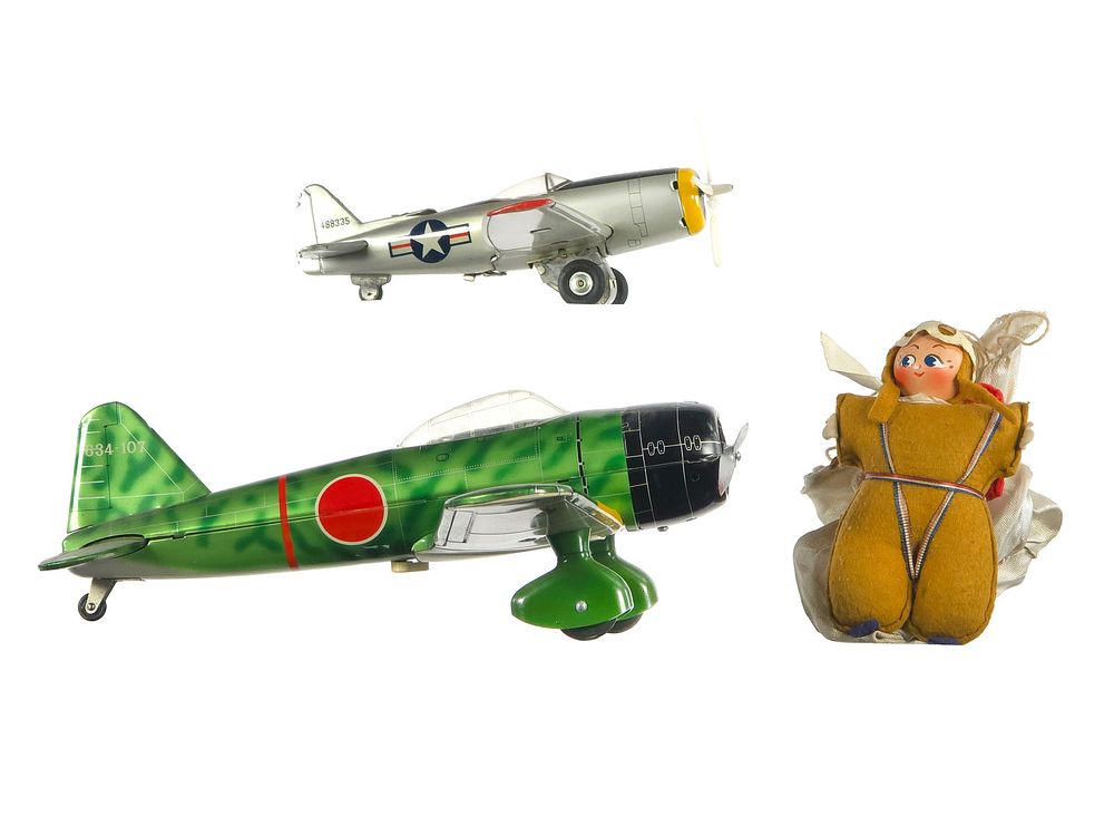 Lot 277: (3) 2 Japanese Tin Military Jets and Parachute Pilot