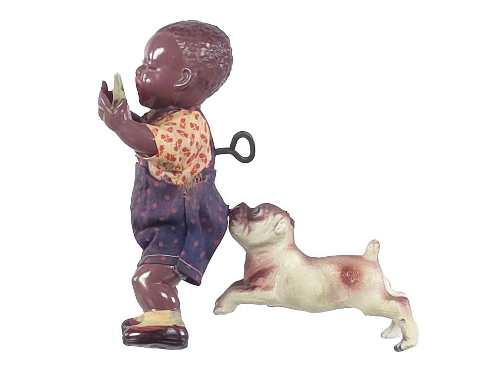 Lot 334: 1930s Black Americana Celluloid Windup CK Poor Pete