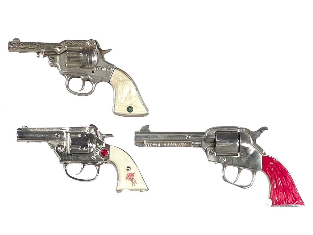 Lot 408: (3) Cowboy Style Cap Guns