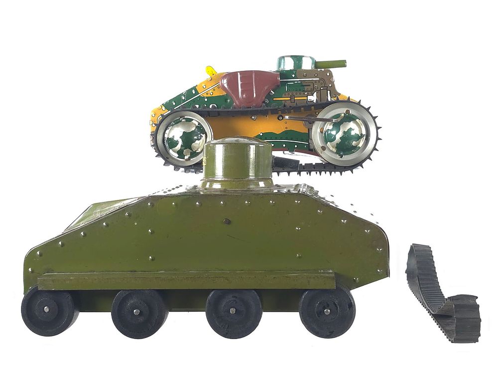 Lot 440: (2) Structo & Marx Army Tanks Large Tin Toys