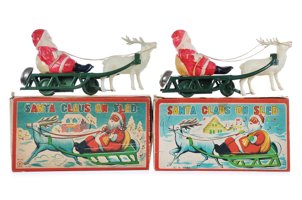 Lot 461: (2) Japanese Tin Windup Santa Claus on Sled Boxed Yonezawa & Mitsushima