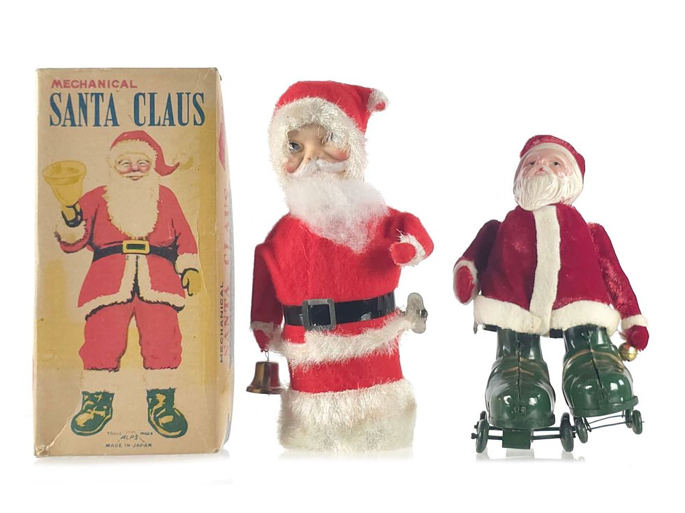 Lot 465: (2) Windup Santas Alps Santa Claus Boxed & Roller Skate Santa