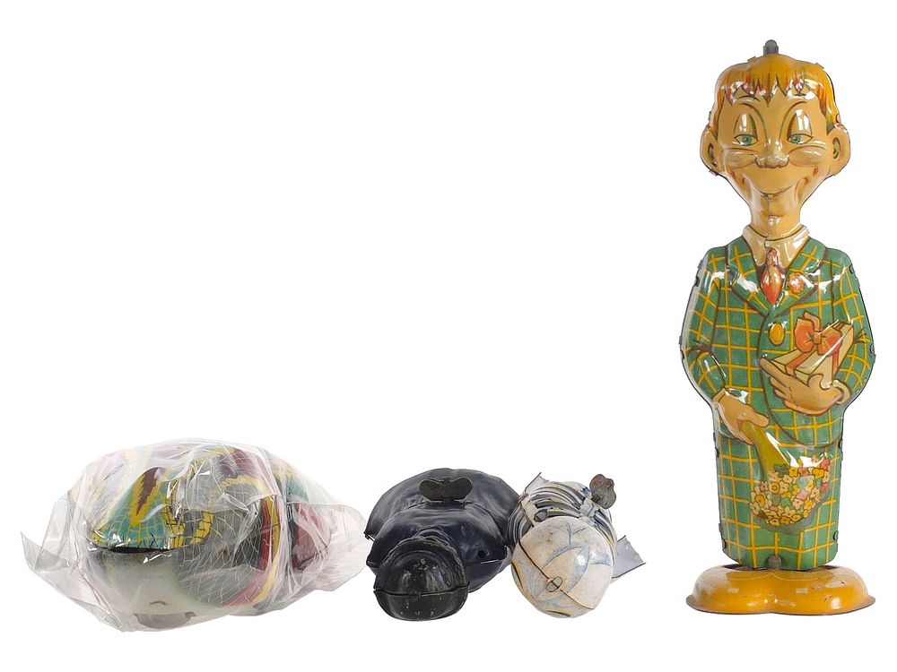 Lot 480: (4) Tin Litho Windup Zombie Toys Marx & B&R