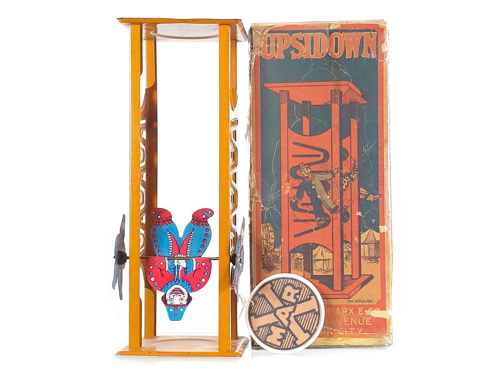Lot 570: Marx 1930s Upside Down Turnover Toy