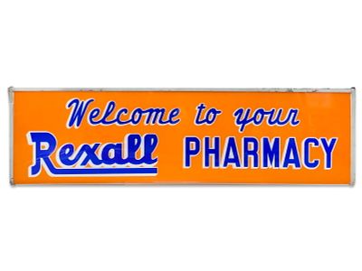 "Welcome to Your Rexall Pharmacy" Electric Sign. Ceiling-mounted double-sided V-shaped sign by 