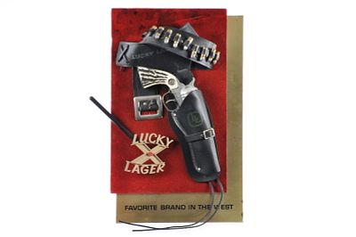 Deluxe Lucky Lager Nichols Cap Gun Advertising Sign. We have only seen a couple of examples of 