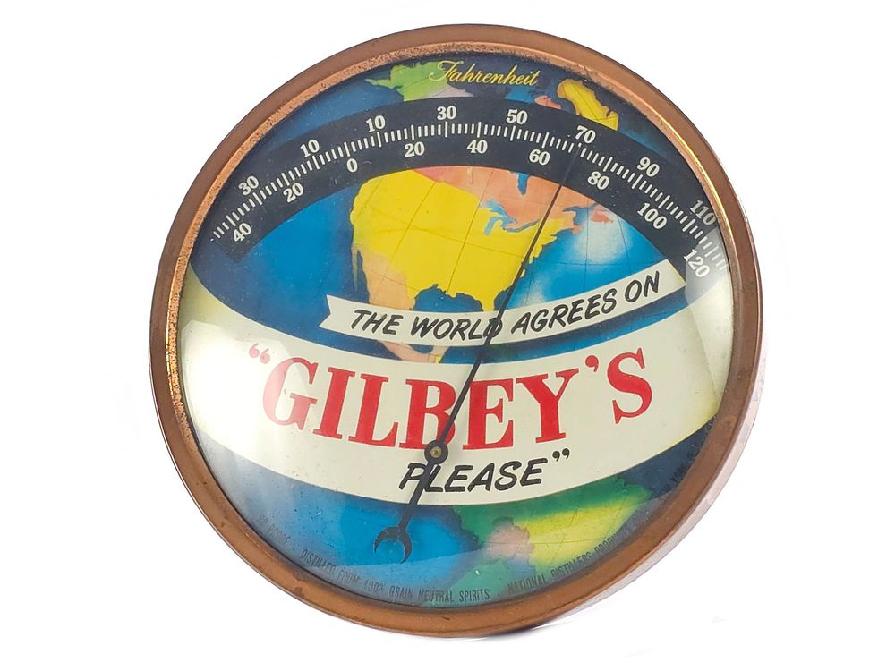 Lot 189: "The World Agrees on Gilbey's Please" Advertising Thermometer