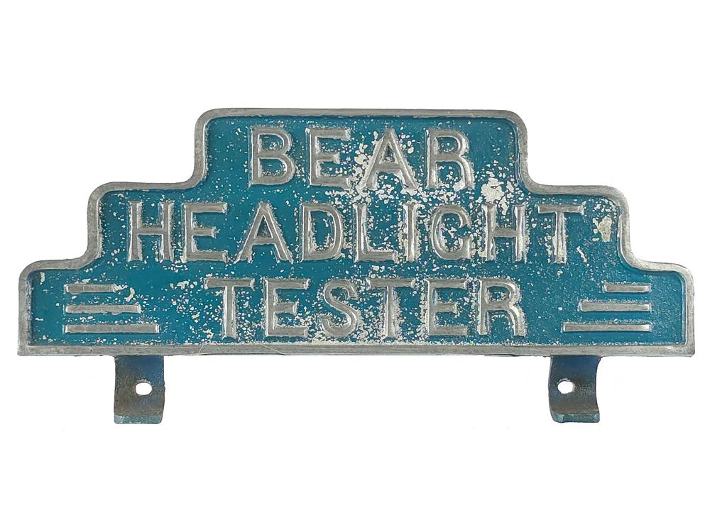 Lot 265: 1950s Bear Headlight Tester Sign Steel
