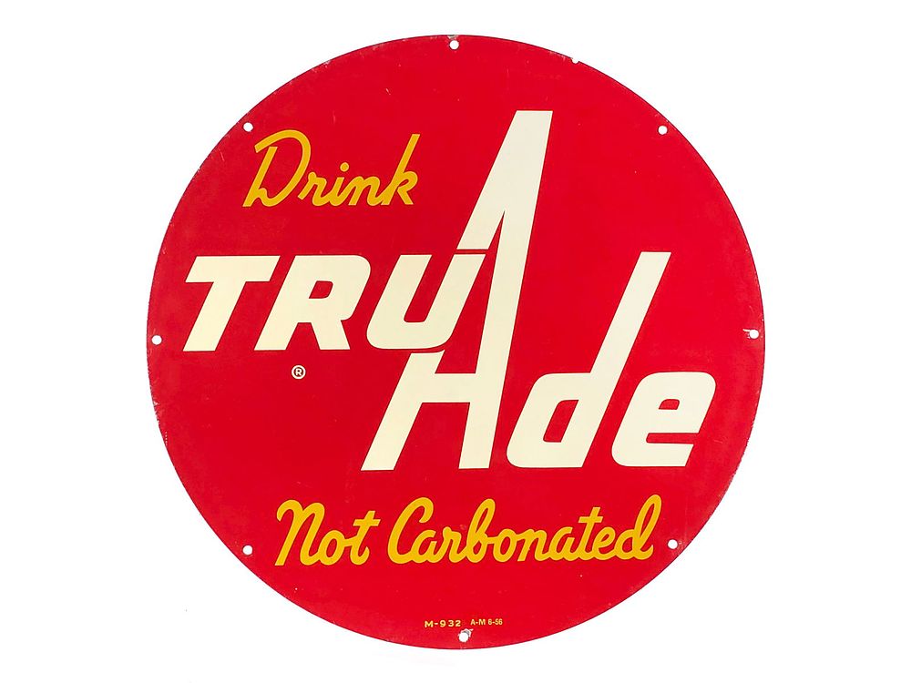 Lot 597: 1950s Drink Tru-Ade Round Tin Advertising Sign