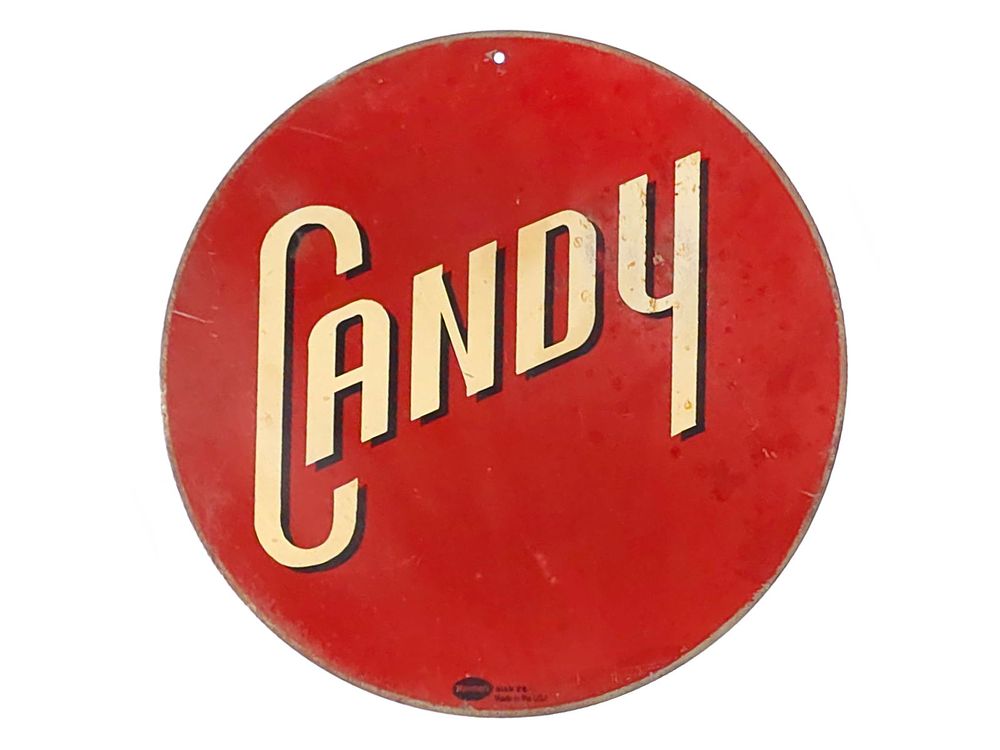 Lot 646: Candy Single-Sided Steel Round Advertising Sign
