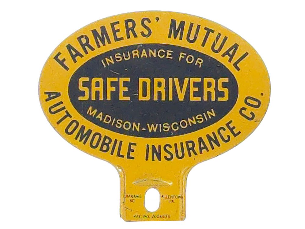 Lot 704: Farmer Mutuals Safe Driver Plate Topper