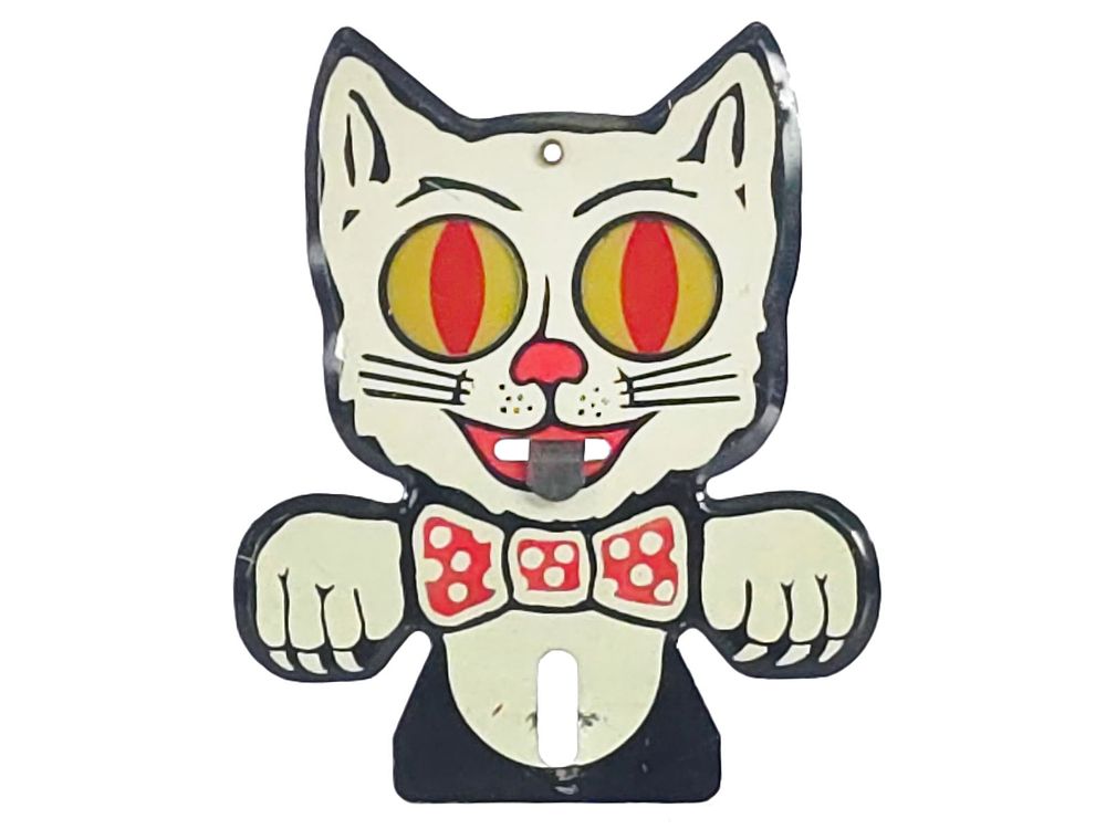 Lot 706: Mittan NYC 1930s Happy Cat Moving Eyes License Plate Topper