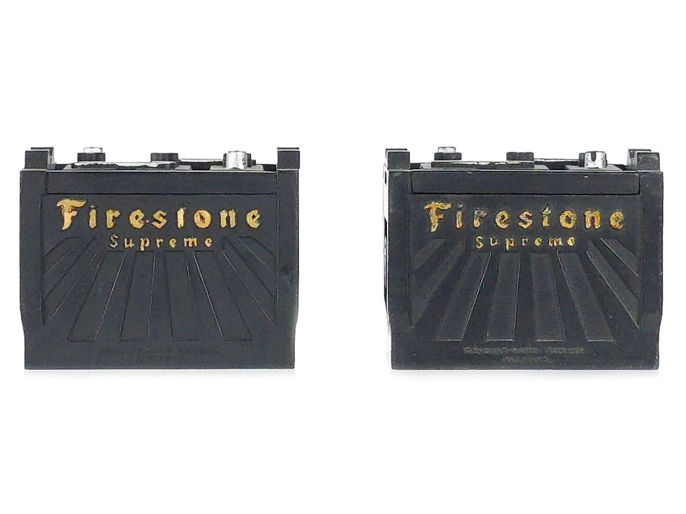 Lot 729: (2) Firestone Battery Shaped Paper Weights
