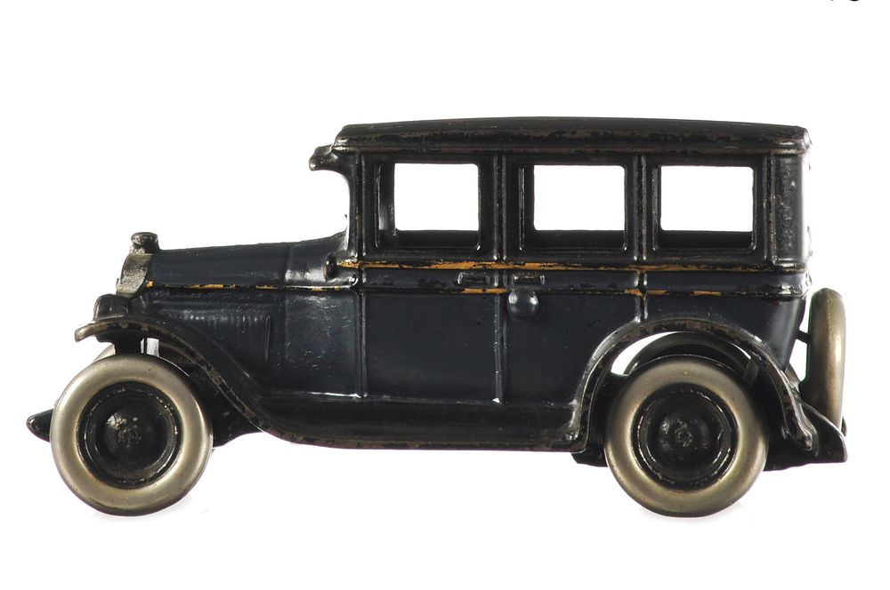 Lot 165: Blue and Black Double Stripe Chevy Sedan, Cast Iron by Arcade