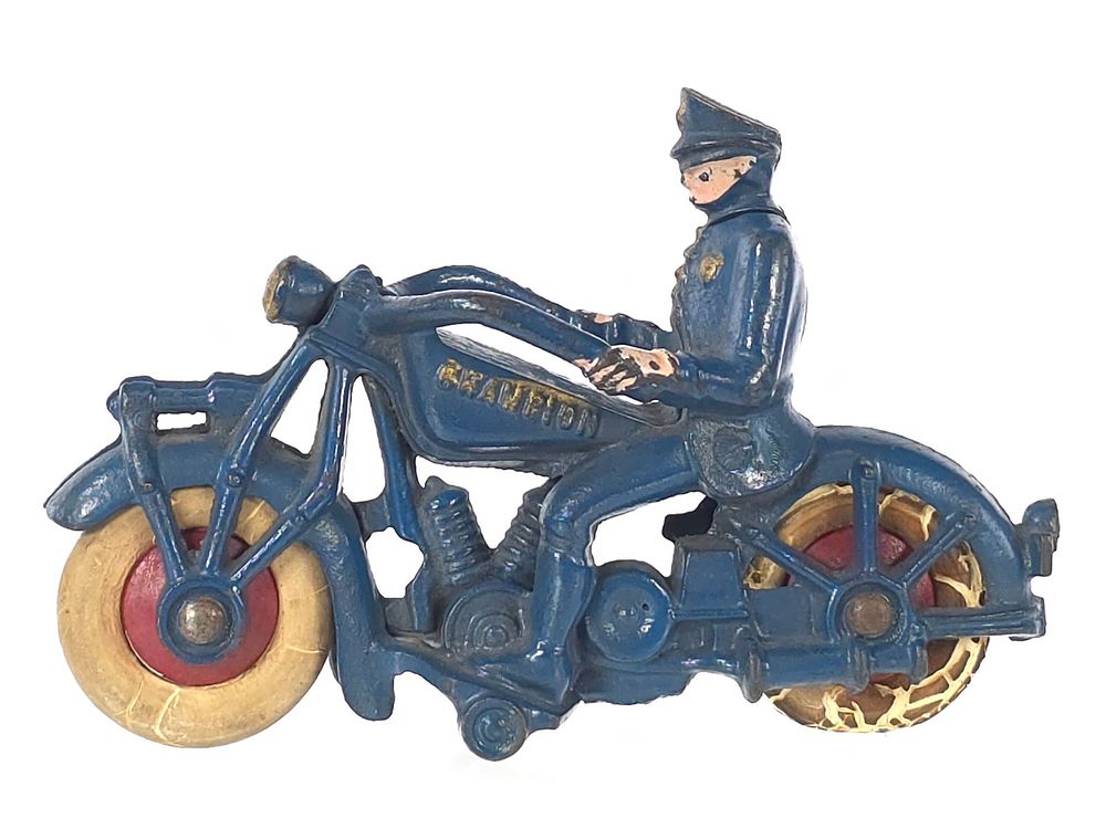 Lot 176: Blue Large Champion Cast Iron Motorcycle