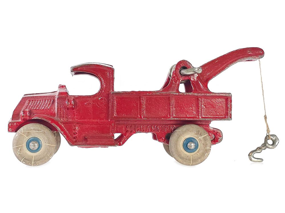 Lot 209: Champion Tow Truck with Red Paint Cast Iron