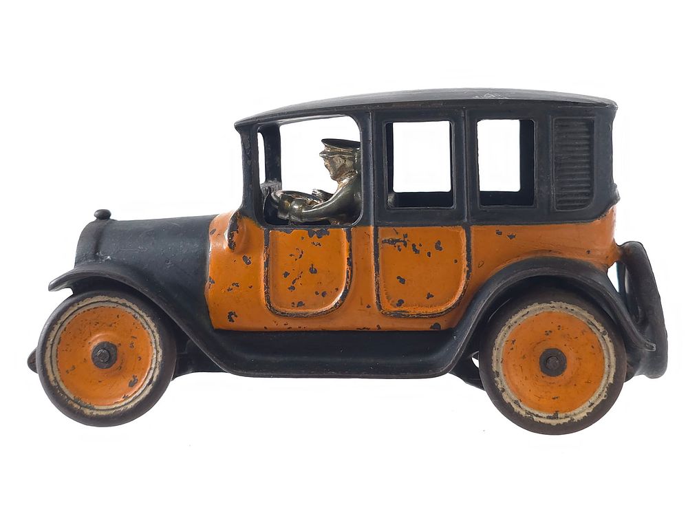 Lot 212: Arcade No. 1 Taxi Cab Cast Iron with Driver in Orange and Black