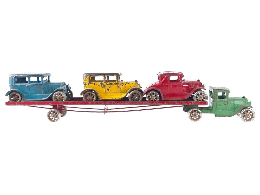 Lot 214: Arcade Model A Car Carrier Cast Iron Truck Trailer and Autos