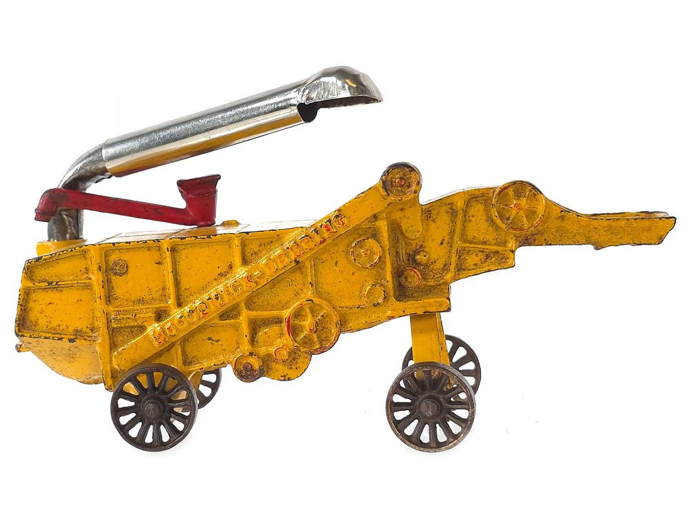 Lot 226: Yellow Arcade Toys Thresher Cast Iron with Sticker