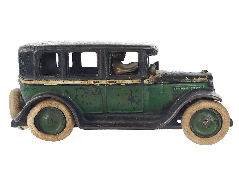 Lot 229: Arcade Toys Green and White Flat Top Taxi Cast Iron