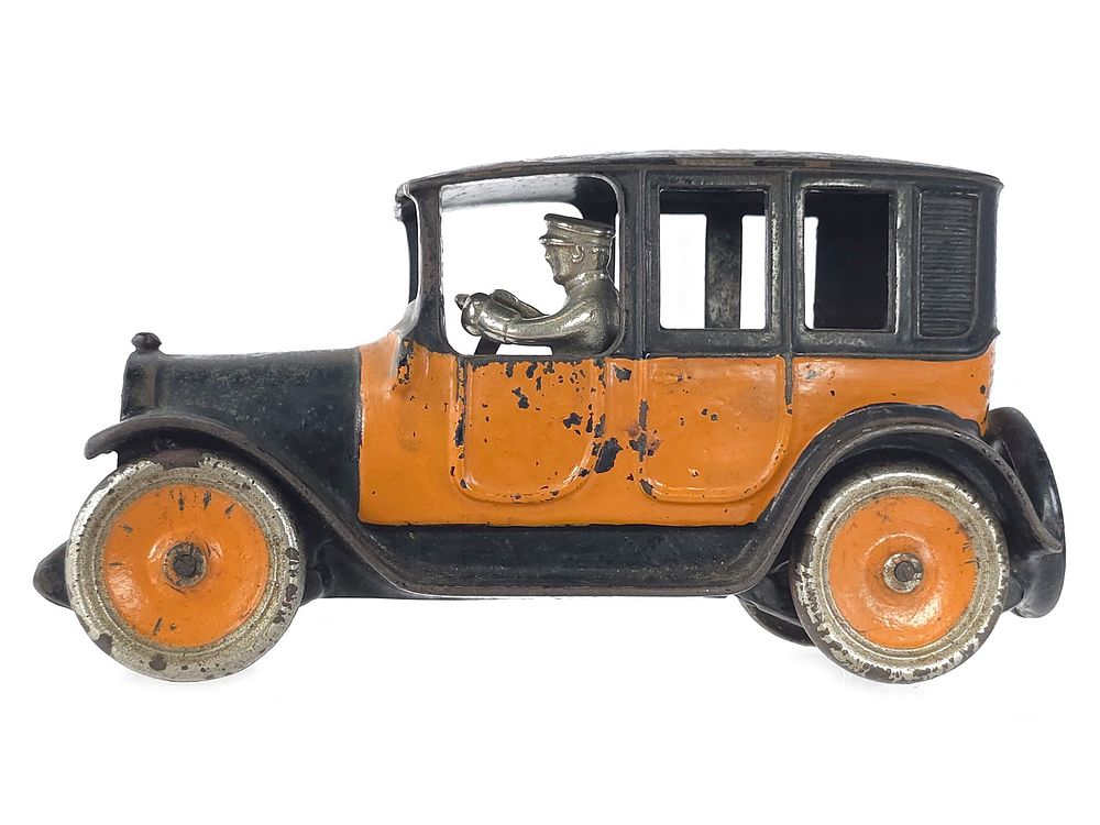 Lot 234: Arcade Cast Iron Yellow Cab with Driver 9 Inch