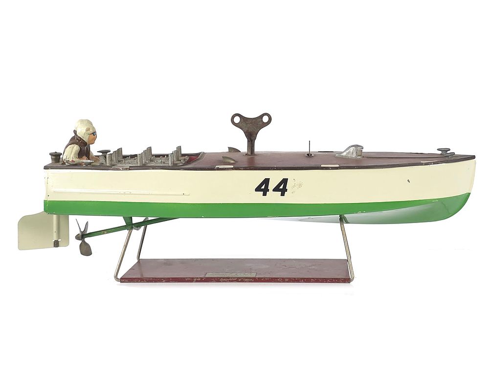 Lot 241: Lionel #44 Windup Race Boat with Stand