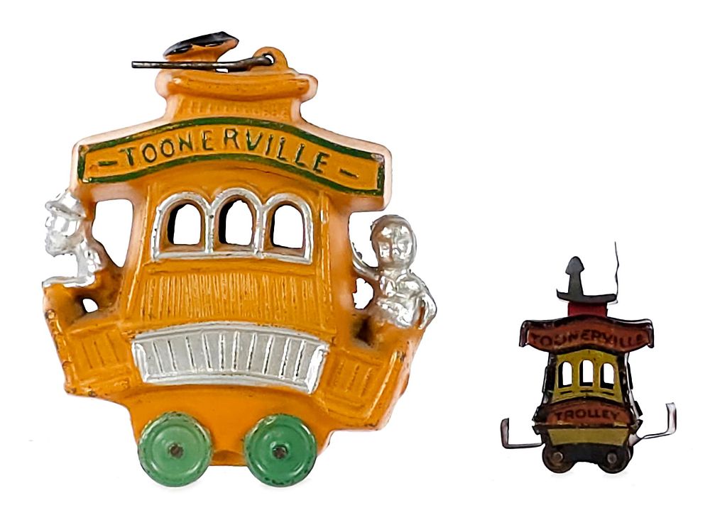 Lot 242: (2) Toonerville Trolley Dent Lead & Cracker Jack Tin Toys