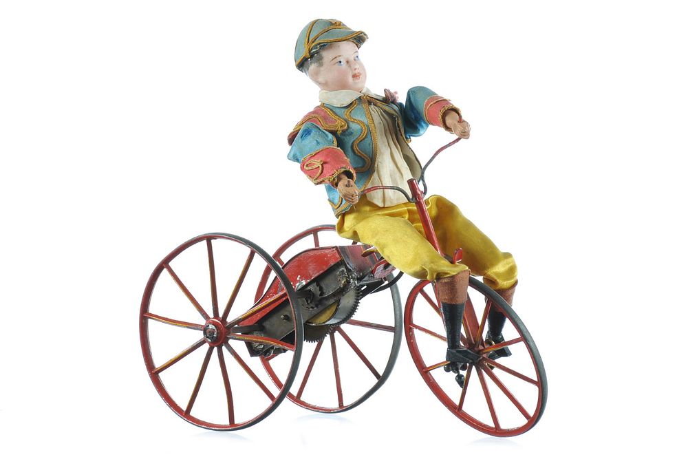 Lot 254: French Vichy ca. 1865 Bisque Head Boy on Tricycle Windup