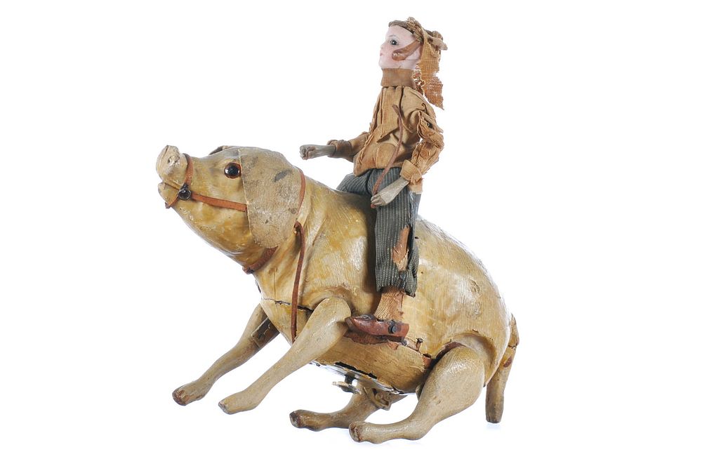 Lot 260: Antique ca. 1890 Clockwork Paper Mache Pig with Rider