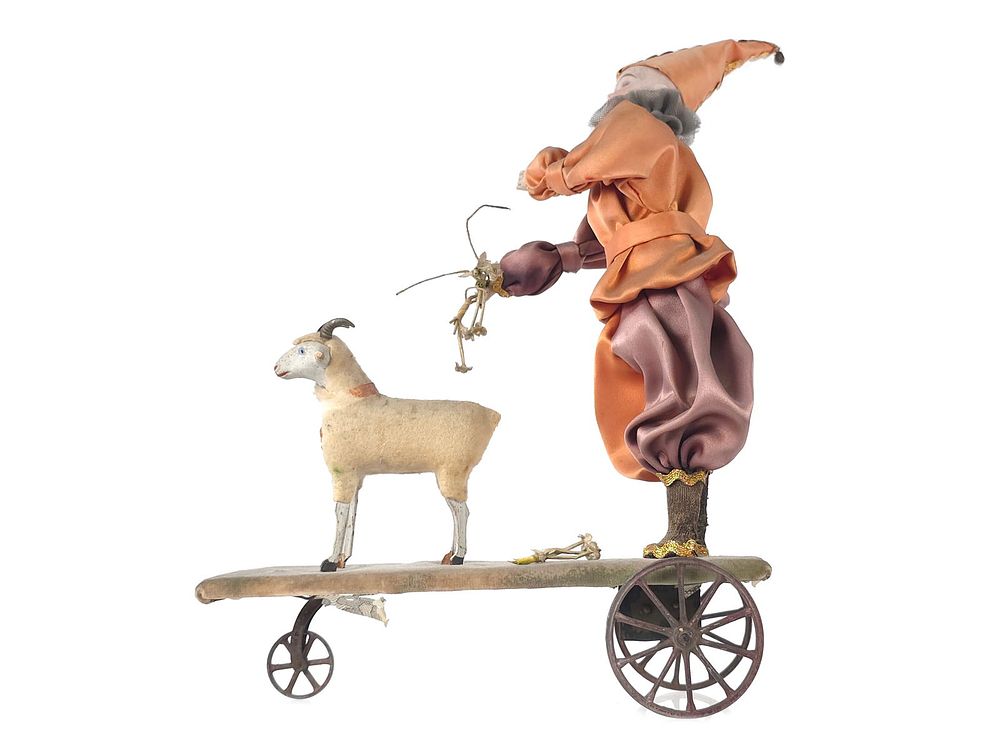 Lot 273: E. Heubach German Clown with Sheep on Windup Platform