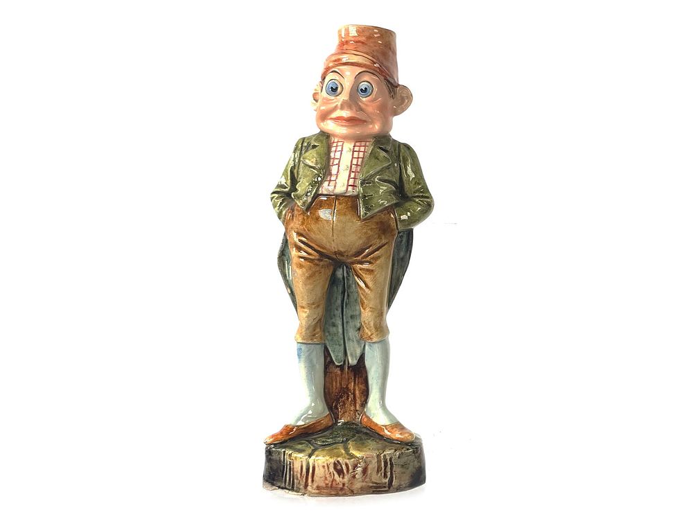 Lot 276: Majolica Palmer Cox Brownie Irish Gentleman Candlestick