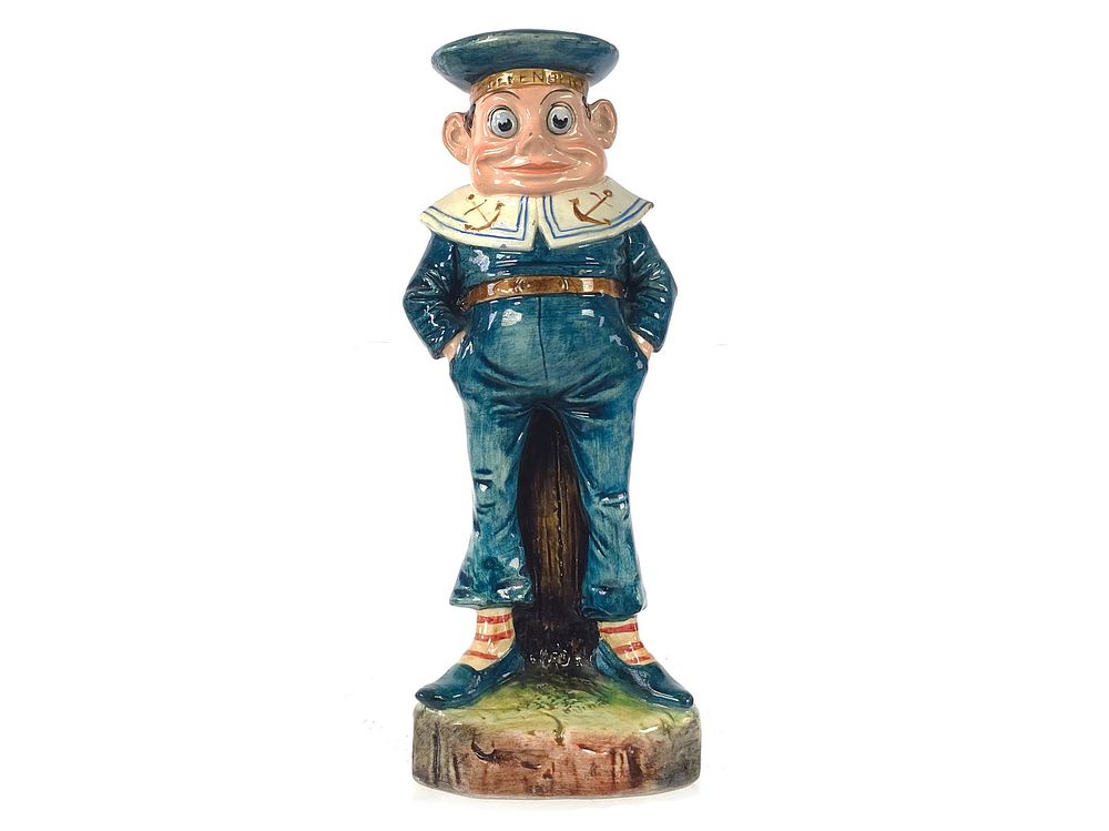 Lot 277: Majolica Palmer Cox Brownie "Defender" Sailor Candlestick