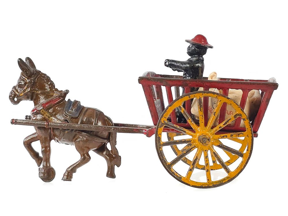 Lot 322: Kenton Mule Cart with Black Cast Iron Driver