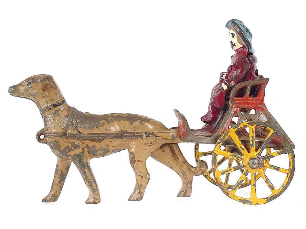 Lot 323: Kenton Dog Cart with Girl Cast Iron