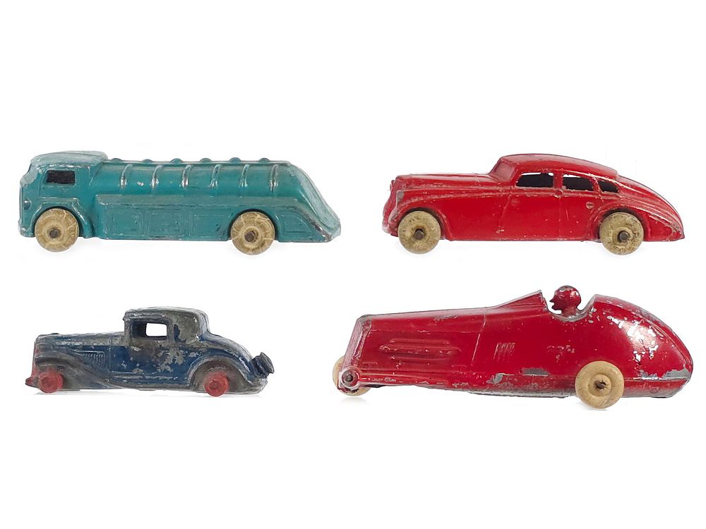 Lot 363: (4) Slush Cast Kansas Novelty and Barclay Cars and Gas Truck