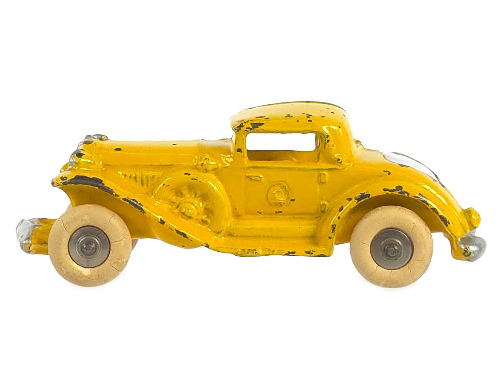 Lot 370: Williams Yellow Cast Iron RIO Coupe