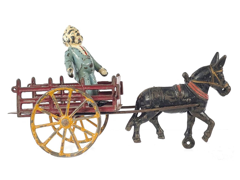 Lot 384: Wilkins Foxy Grandpa Stake Cart Cast Iron