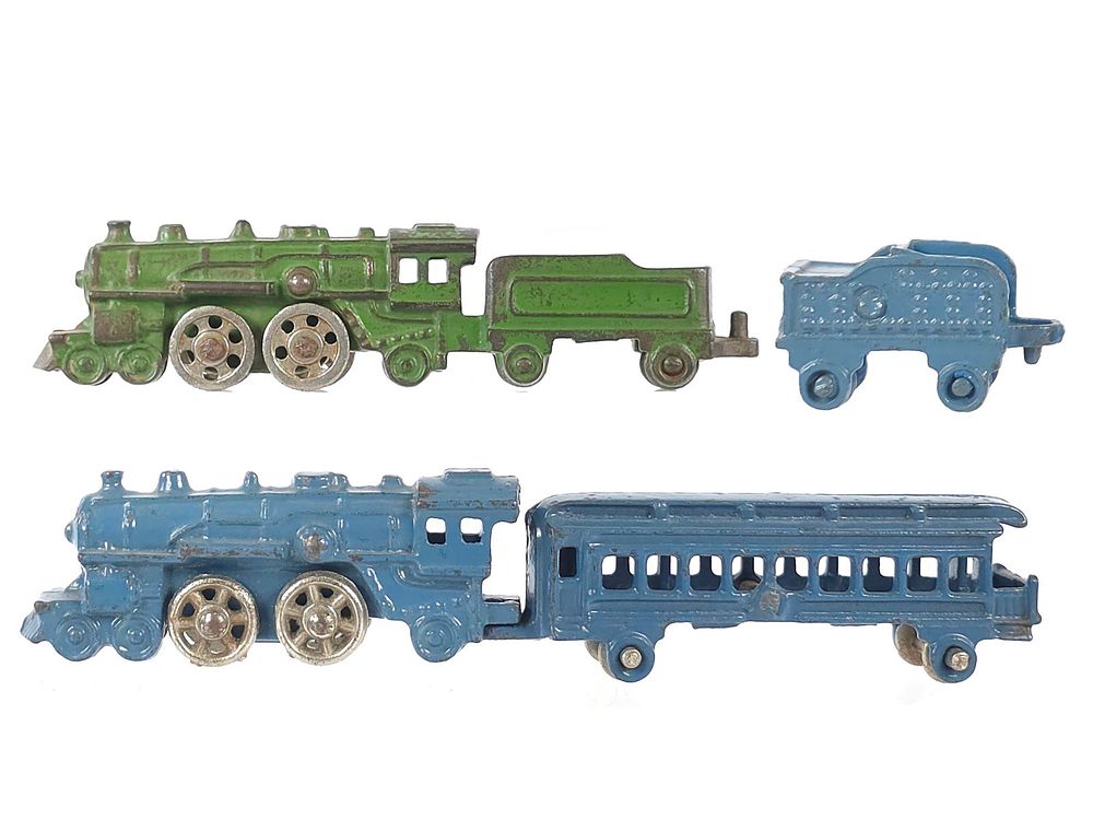 Lot 386: (2) Kilgore Cast Iron Train Set in Blue and Green