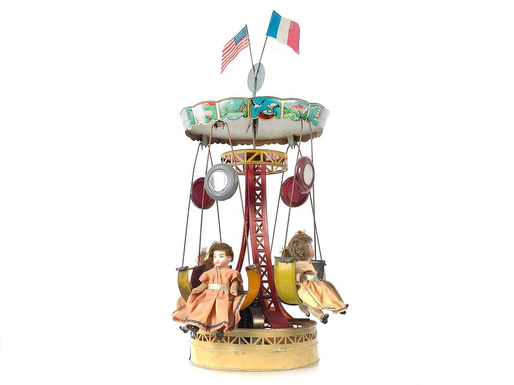 Lot 297: Welker Krauss Tin Merry-Go-Round with Porcelain Dolls, Germany